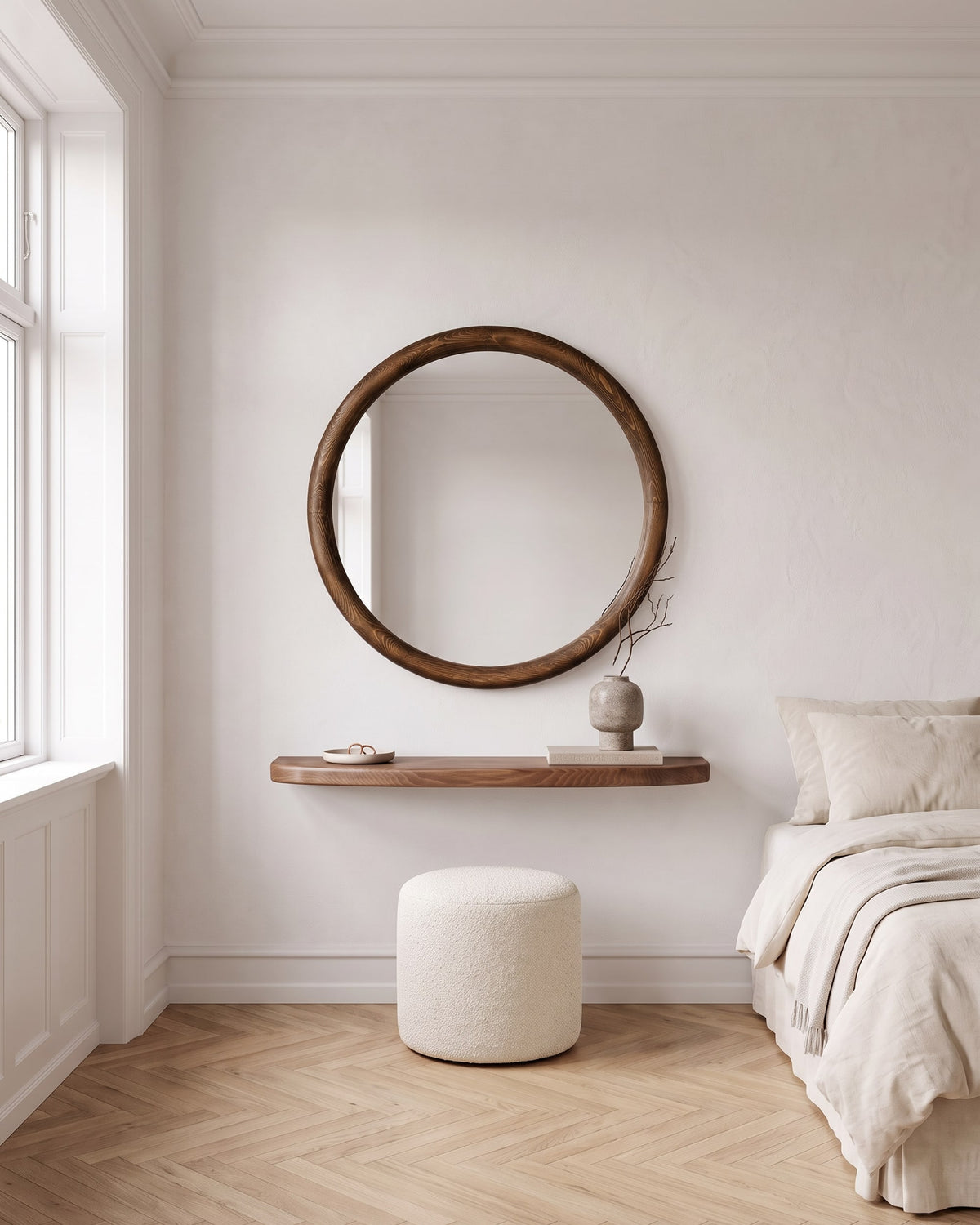Mira round mirror with floating shelf used as a small vanity in a calm bedroom